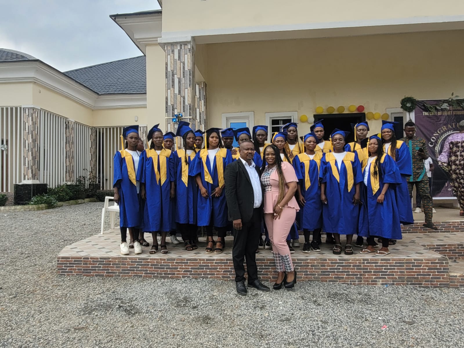 Graduates and supporters outside City of Light